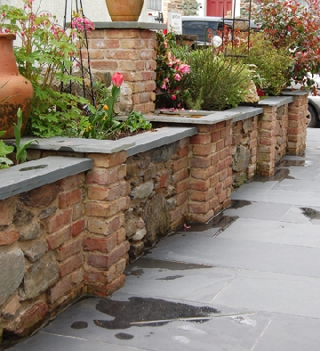 Ardosia slate external floor slabs with garden flower area cills